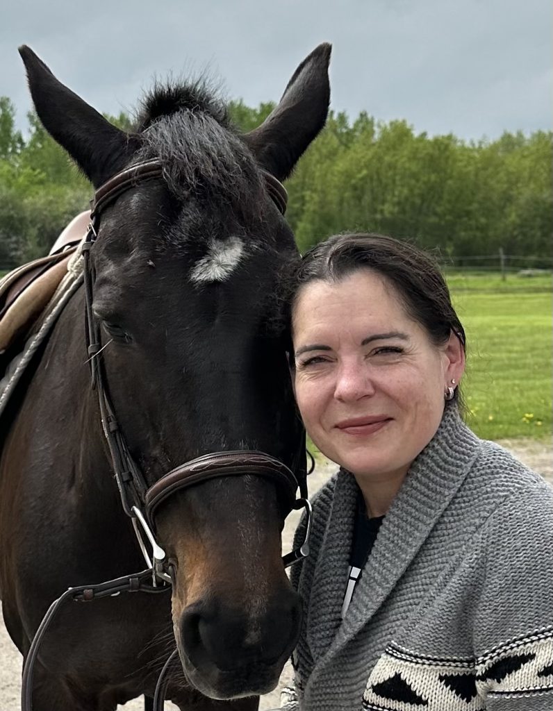 Terri and Lexi a black horse